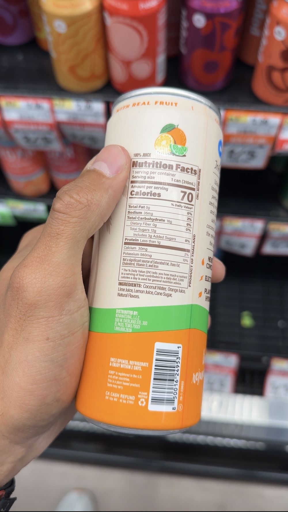 Reading the nutrition facts on a grocery product.